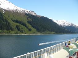 Coast Guard boat escorting the Norwegian Pearl approaching Juneau Alaska.jpg