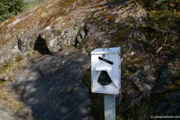 Dog poop pickup Mitt dispenser at the Mendenhall Glacier visitor area.jpg