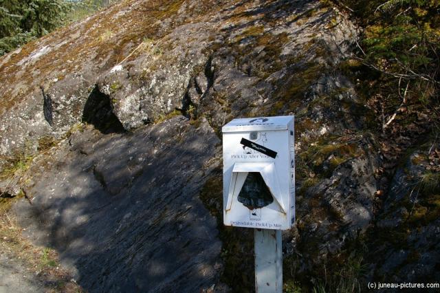 Dog poop pickup Mitt dispenser at the Mendenhall Glacier visitor area.jpg