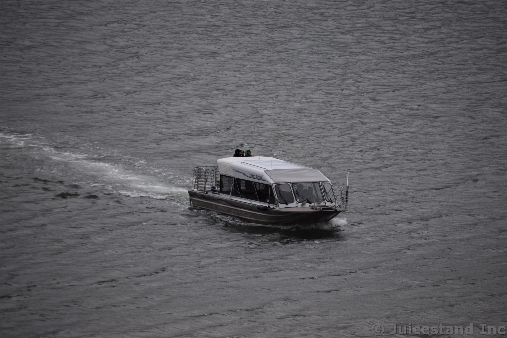 Canopy Express Boat in the Waters Near Downtown Juneau