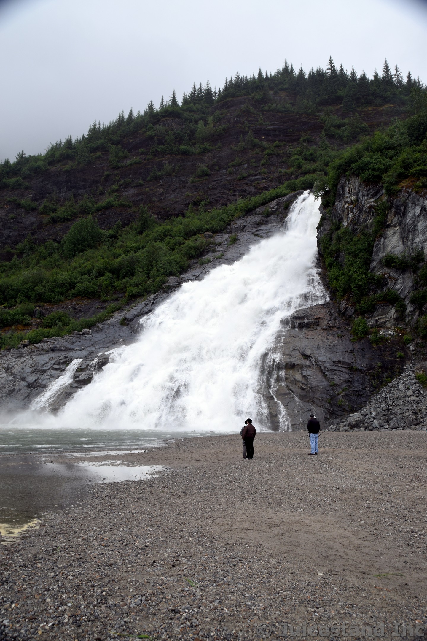 Visitors Looking at Nugget Falls Waterfall