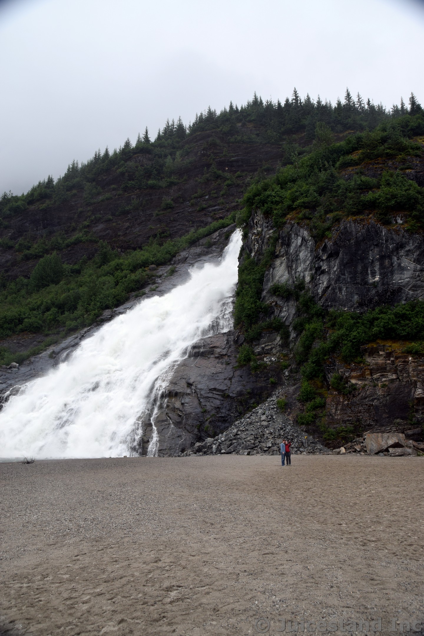 Visitors Take a Selfie next to Nugget Falls