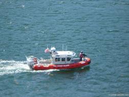 US Coast Guard with gun turret next to the Norwegian Pearl in Juneau.jpg